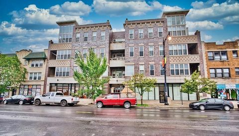 Photo of 3113 W Lawrence Avenue #A302, Chicago, IL 60625 (MLS # 12615154)