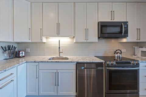 Tiny photo for 4838 Howard Street #401, Skokie, IL 60077 (MLS # 12462905)