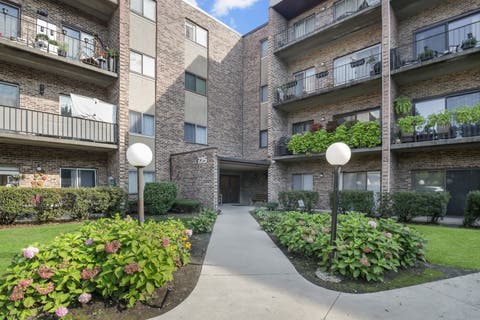 Photo of 725 W Huntington Commons Road #306, Mount Prospect, IL 60056 (MLS # 12740271)