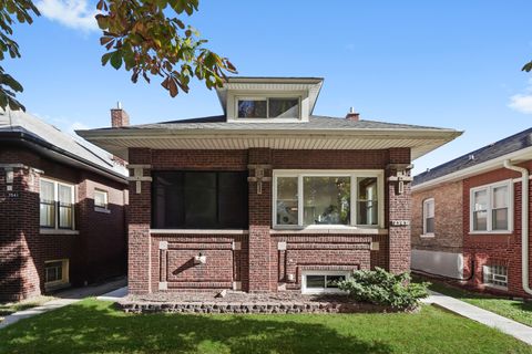 Photo of 7545 S Merrill Avenue, Chicago, IL 60649 (MLS # 12554416)