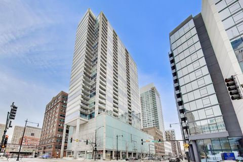 Photo of 611 S Wells Street #2204, Chicago, IL 60607 (MLS # 12639323)