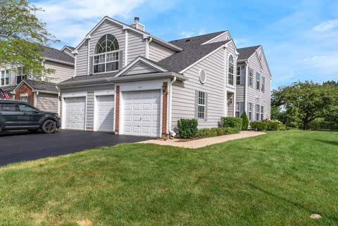 Photo of 61 Adams Court #A, Streamwood, IL 60107 (MLS # 12725368)