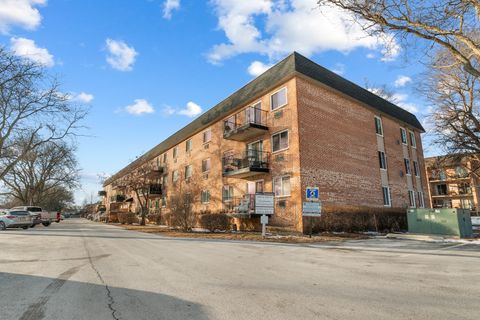 Photo of 1001 N Mill Street #302, Naperville, IL 60563 (MLS # 12573087)