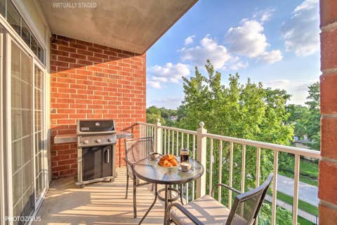 Tiny photo for 1 ITASCA Place #302, Itasca, IL 60143 (MLS # 12728956)