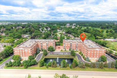 Photo of 1 ITASCA Place #302, Itasca, IL 60143 (MLS # 12728956)