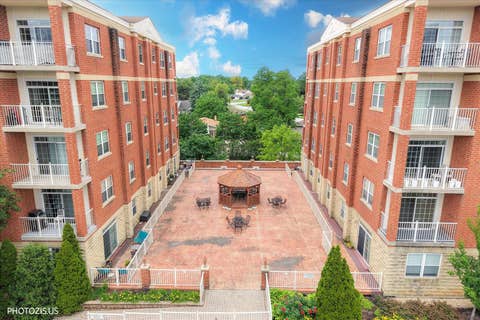 Tiny photo for 1 ITASCA Place #302, Itasca, IL 60143 (MLS # 12728956)