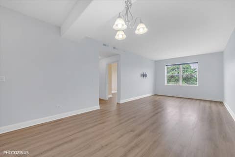 Tiny photo for 1 ITASCA Place #302, Itasca, IL 60143 (MLS # 12728956)