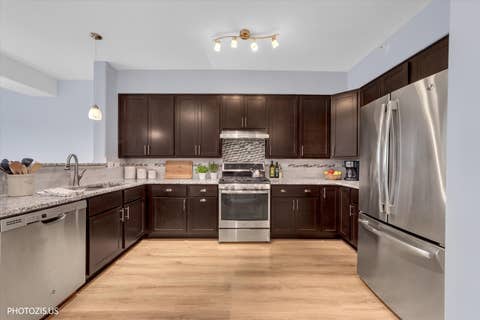 Tiny photo for 1 ITASCA Place #302, Itasca, IL 60143 (MLS # 12728956)