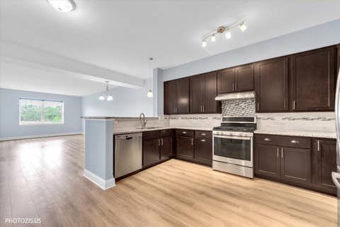 Tiny photo for 1 ITASCA Place #302, Itasca, IL 60143 (MLS # 12728956)
