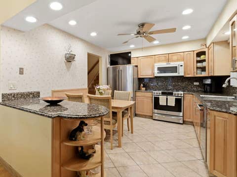 Tiny photo for 9437 N Lockwood Avenue, Skokie, IL 60077 (MLS # 12647225)