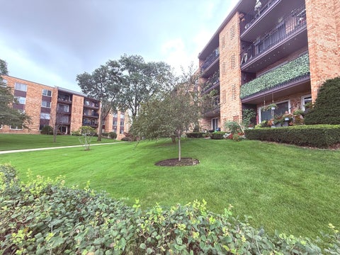 Photo of 502 W Huntington Commons Road #438, Mount Prospect, IL 60056 (MLS # 12759904)