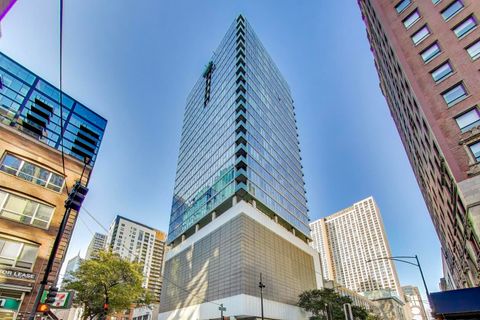 Photo of 550 N Saint Clair Street #1303, Chicago, IL 60611 (MLS # 12496008)
