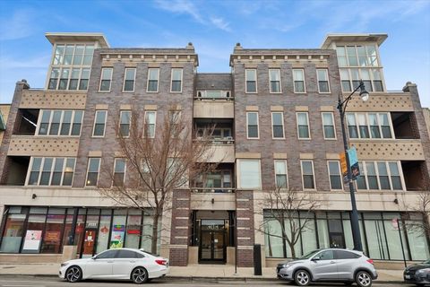 Photo of 3113 W Lawrence Avenue #A201, Chicago, IL 60625 (MLS # 12587008)