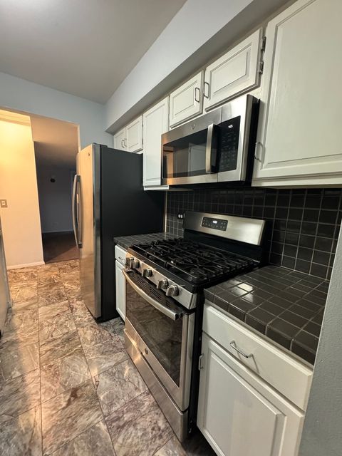 Tiny photo for 850 Wellington Avenue #304, Elk Grove Village, IL 60007 (MLS # 12319101)