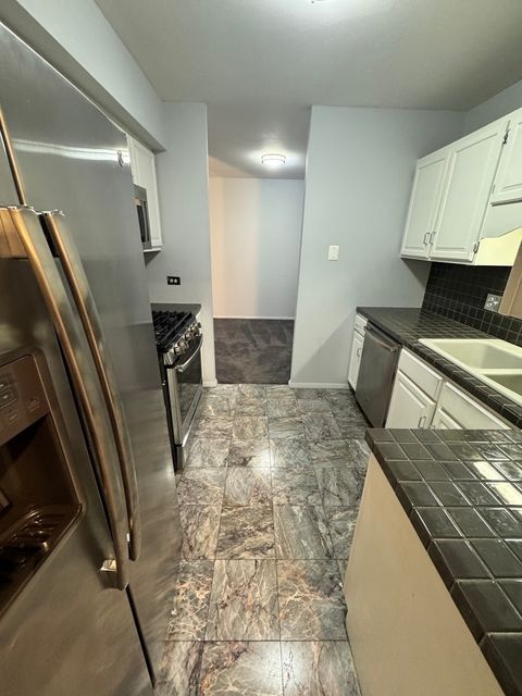 Tiny photo for 850 Wellington Avenue #304, Elk Grove Village, IL 60007 (MLS # 12319101)