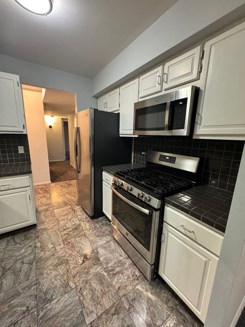 Tiny photo for 850 Wellington Avenue #304, Elk Grove Village, IL 60007 (MLS # 12319101)