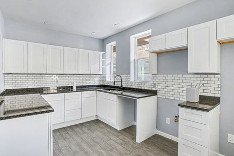 Tiny photo for 7449 S Bennett Avenue, Chicago, IL 60649 (MLS # 12528353)