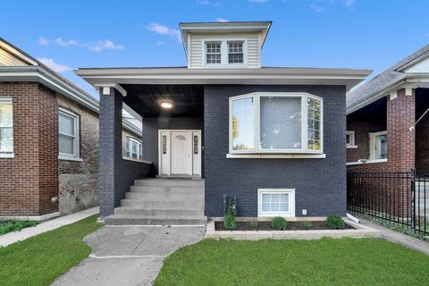 Photo of 3217 W 64th Place, Chicago, IL 60629 (MLS # 12480107)