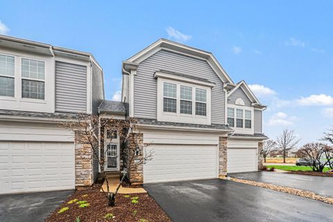 Photo of 102 Devoe Drive #102, Oswego, IL 60543 (MLS # 12609519)
