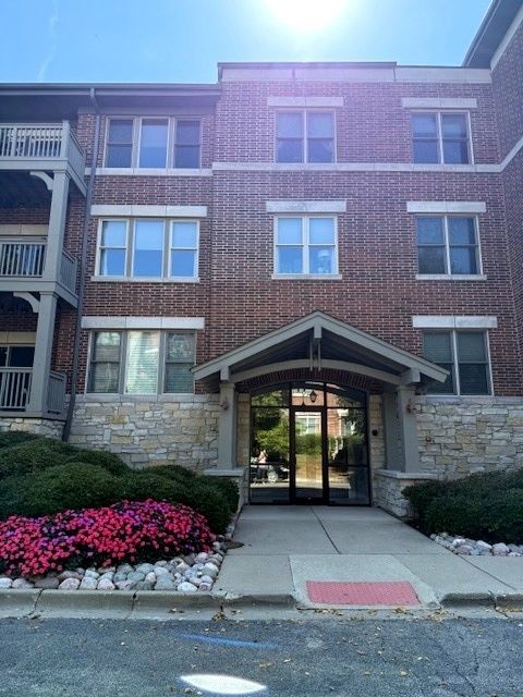 Photo of 275 E Railroad Avenue #301, Bartlett, IL 60103 (MLS # 12475273)