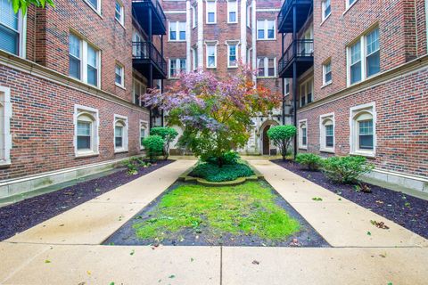 Photo of 2335 E 70th Place #205, Chicago, IL 60649 (MLS # 12697091)