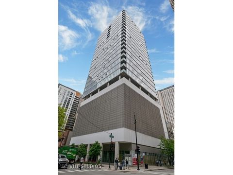 Photo of 550 N St Clair Street #2002, Chicago, IL 60611 (MLS # 12688256)