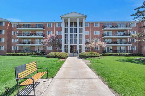 Photo of 1050 N Farnsworth Avenue #301, Aurora, IL 60505 (MLS # 12628935)