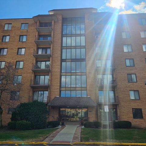 Photo of 1717 W CRYSTAL Lane #310, Mount Prospect, IL 60056 (MLS # 12613322)