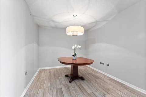 Tiny photo for 9655 Woods Drive #1006, Skokie, IL 60077 (MLS # 12689570)