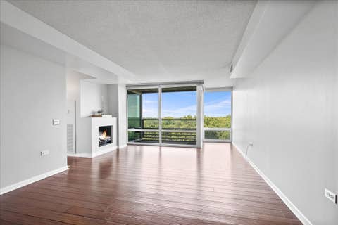 Tiny photo for 9655 Woods Drive #1006, Skokie, IL 60077 (MLS # 12689570)