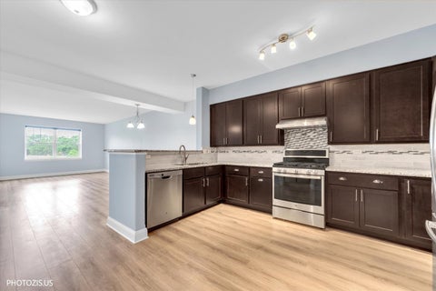 Tiny photo for 1 ITASCA Place #302, Itasca, IL 60143 (MLS # 12684431)