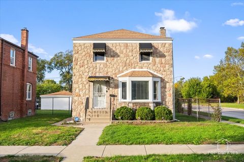 Photo of 400 W 99th Place, Chicago, IL 60628 (MLS # 12504604)