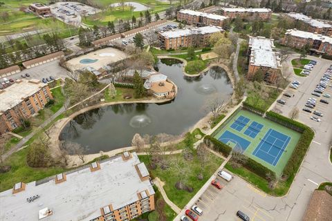 Photo of 1117 S OLD WILKE Road #402, Arlington Heights, IL 60005 (MLS # 12619468)