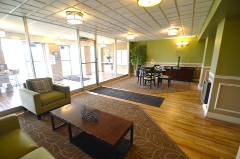 Tiny photo for 5400 Walnut Avenue #111, Downers Grove, IL 60515 (MLS # 12616912)