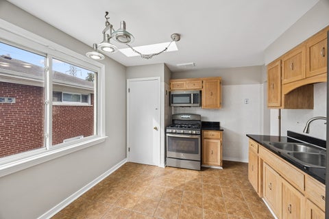 Tiny photo for 4612 Grove Avenue, Forest View, IL 60402 (MLS # 12795373)