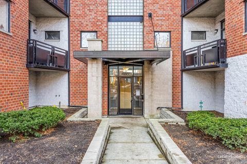 Photo of 2327 W Wolfram Street #311, Chicago, IL 60618 (MLS # 12540654)