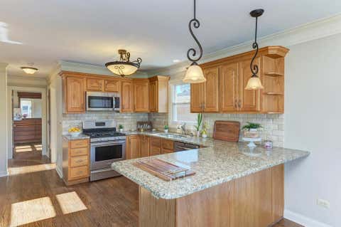 Tiny photo for 9956 Ivanhoe Avenue, Schiller Park, IL 60176 (MLS # 12647752)