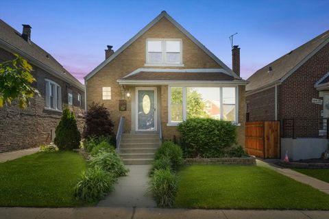 Photo of 6615 S Keating Avenue, Chicago, IL 60629 (MLS # 12495463)