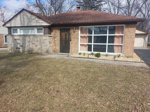 Photo of 318 MINOCQUA Street, Park Forest, IL 60466 (MLS # 12575420)