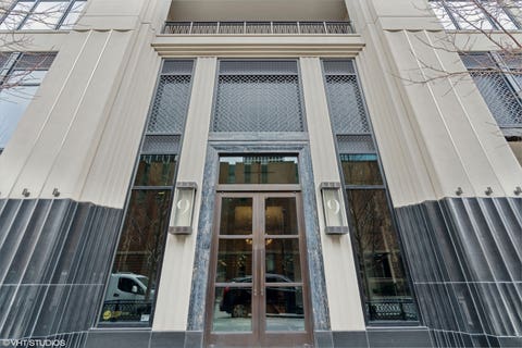 Photo of 9 W Walton Street #702, Chicago, IL 60610 (MLS # 12697068)