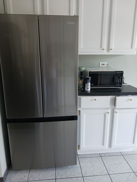 Tiny photo for 9330 HAMILTON Court #E, Des Plaines, IL 60016 (MLS # 12500475)