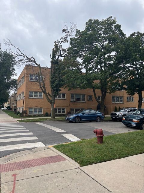 Photo of 5601 W Byron Street #A, Chicago, IL 60634 (MLS # 12684076)