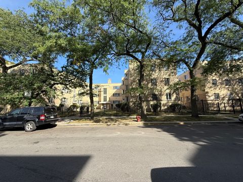 Photo of 2032 E 72nd Place #2E, Chicago, IL 60649 (MLS # 12482833)