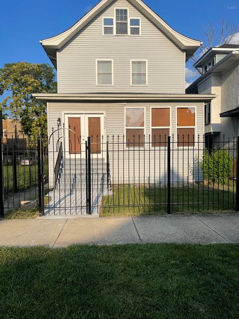 Photo of 557 N Leamington Avenue, Chicago, IL 60644 (MLS # 12622268)