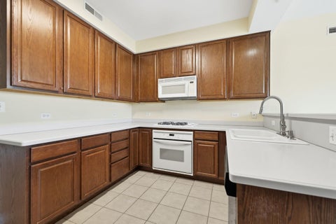 Tiny photo for 101 Pointe Drive #203, Northbrook, IL 60062 (MLS # 12444159)
