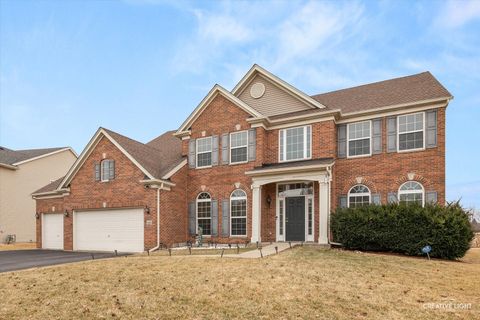 Photo of 329 Chick Evans Street, Bolingbrook, IL 60490 (MLS # 12584998)