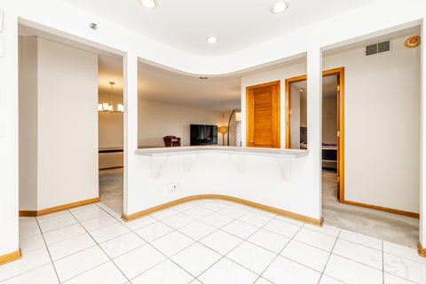 Tiny photo for 6755 N Milwaukee Avenue #505, Niles, IL 60714 (MLS # 12765864)