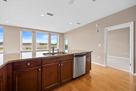 Tiny photo for 801 Village Center Drive #302, Burr Ridge, IL 60527 (MLS # 12719520)
