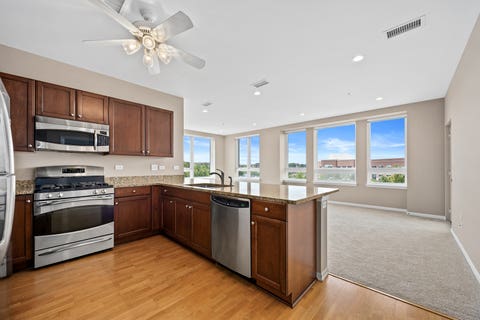 Tiny photo for 801 Village Center Drive #302, Burr Ridge, IL 60527 (MLS # 12719520)