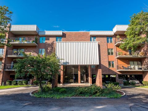 Photo of 6545 Main Street #408, Downers Grove, IL 60516 (MLS # 12491494)